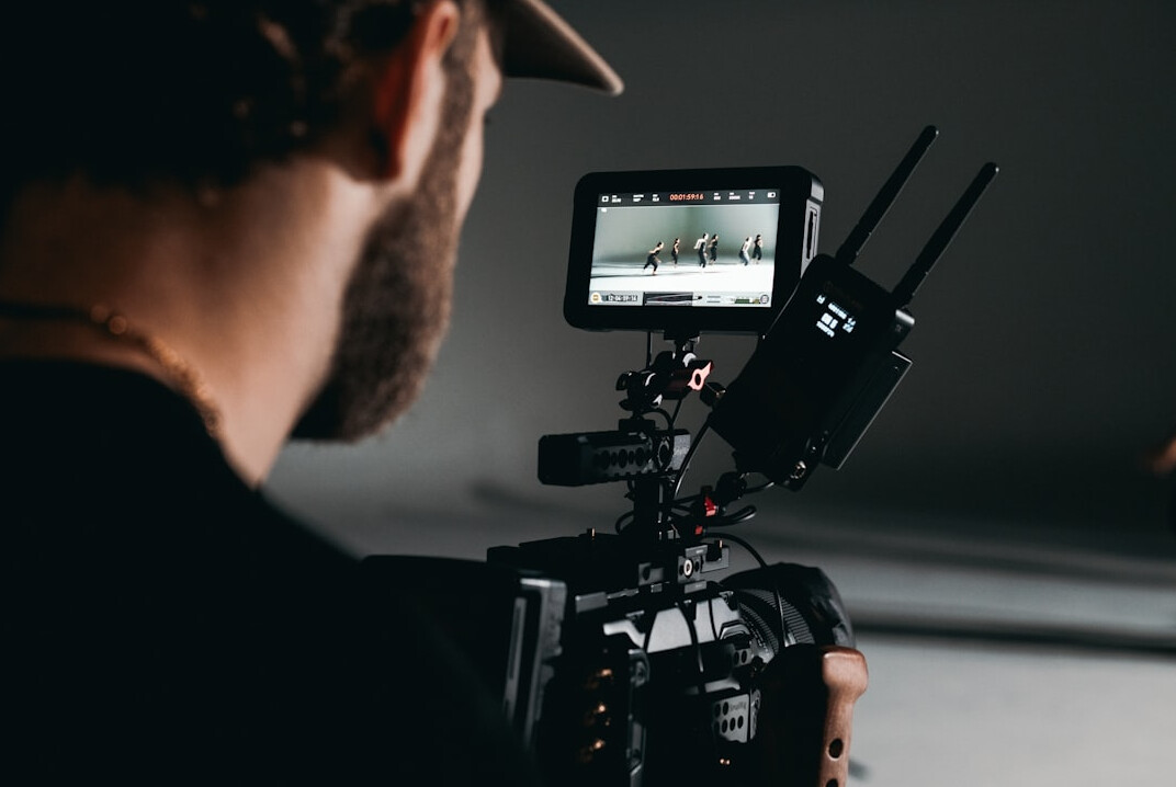 filmmaker reviewing footage